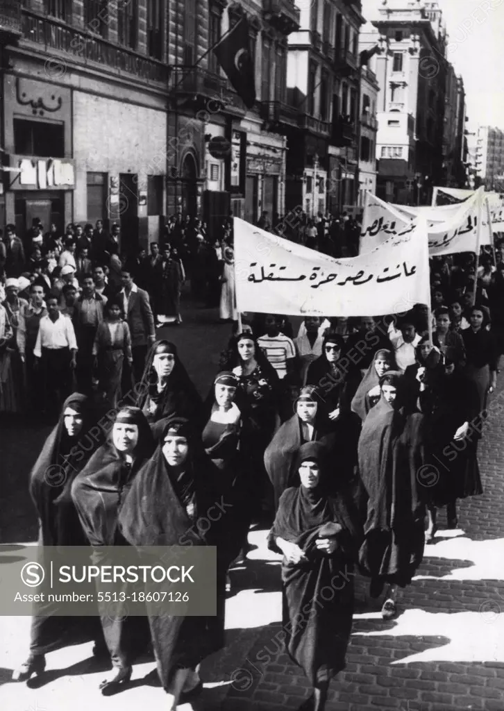 Black-Garbed Woman in Cairo's Anti-British Demonstration:Egyptian women in their traditional black dress, led the parade of women and girls through the Streets of Cairo during the great Anti-British demonstration in which, it is said, about a million Egyptians participated. The business life of this City was brought to a standstill by the demonstration. November 15, 1951.