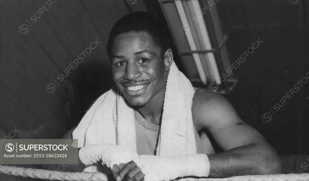 American bantam Billy Peacock was happy and confident when this picture was taken before his final gym workout for his Melbourne fight last night. However, he was thrashed by Italian D'Agata who *****. December 11, 1954.