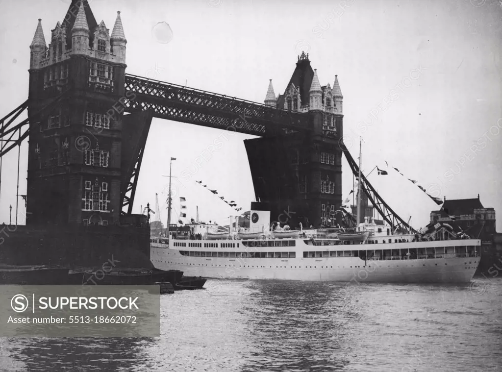 World's Most Looked at Bridge - -"Saga" the Swedish liner passing through Tower Bride. It will be seen that when large vessels pass the roadway of the bridge have to be raised to their fullest extent.Tower Bridge is not be tallest or the longest in World, but it could surely claim to be the most "Looked At" bridge in the world. Millions of visitors to London, stand on London bridge but they go there to look at tower bridge. Built by the city of London corporation and opened by King Edward VII ((then Prince of Wales) in 1894. It is the first bridge oveli the thames and with its huge cascules is probably the largest lifting road bridge in the world, and the one thing a visitor to London must not miss, is to see tower bridge go up. January 01, 1947. (Photo by Barratt's). 