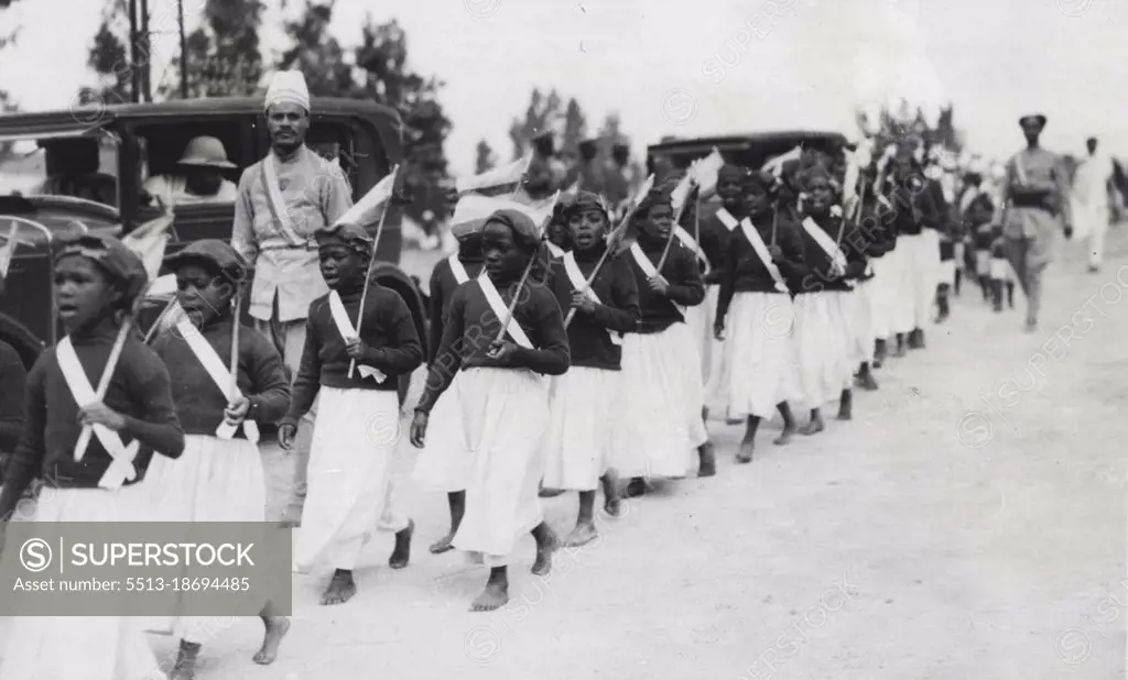 Addis Ababa Celebrates End Of Rainy Season - Little girls marching past the Emperor in St. Georgels square, Addis Ababa. Picture just received in London, showing the celebration of feast of the Masqal, at the end of the rainy season, in Addis Ababa. The Emperor attended the ceremony - which was carried out in pouring rain - in front of St. George's Cathedral. October 7, 1935. (Photo by Keystone).