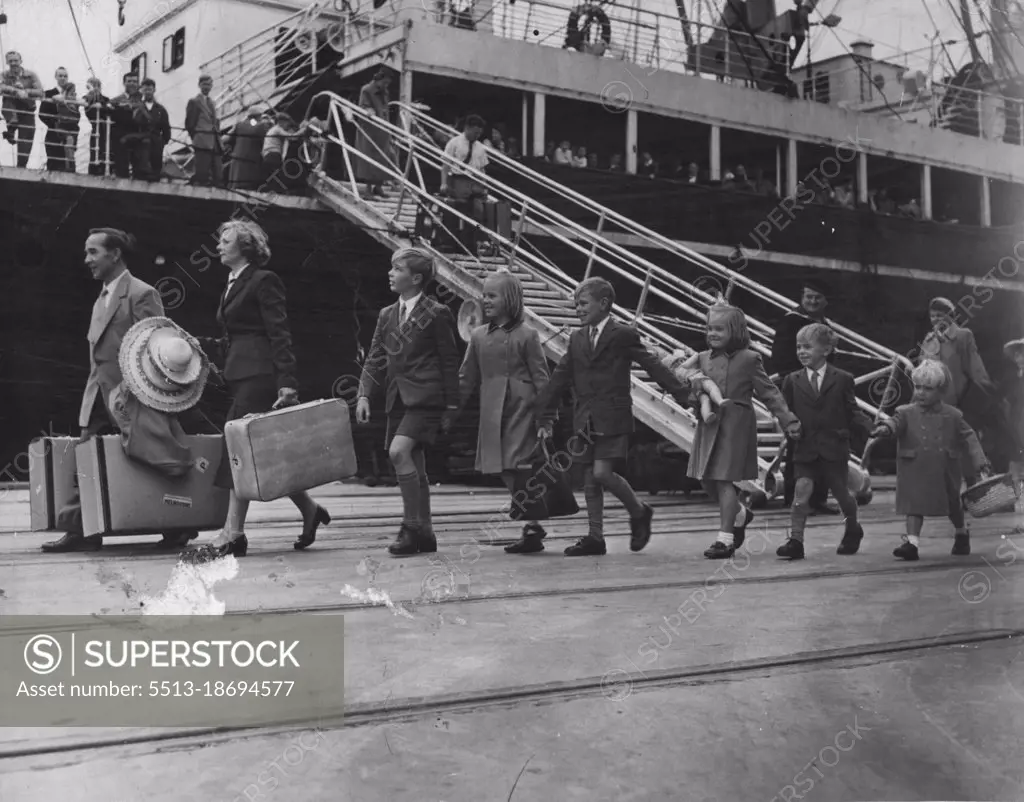 A typical British migrant family comes ashore. Migration: "Migrants are pouring in and the work force is building up rapidly...". Sunshine versus Vietnam A British migrant family steps into Australia. November 17, 1955. 