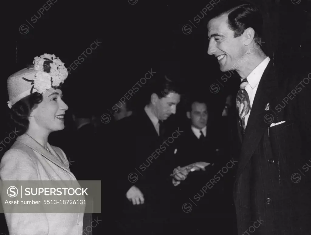 Princess's Visit Film Studio -- Princess Elizabeth is been chatting with Chips Rafferty. The Australian film star, who is over here to take part in the new production Nicholas Nickleby.Princess Elizabeth Accompanied by Princess Margaret, paid a visit to Ealing Studios, London, today June 06, where they met a number of film actors and also watched the 'Shooting' of a scene in the new production Nicholas Nickleby. July 09, 1946. (Photo by Associated Press Photo).    