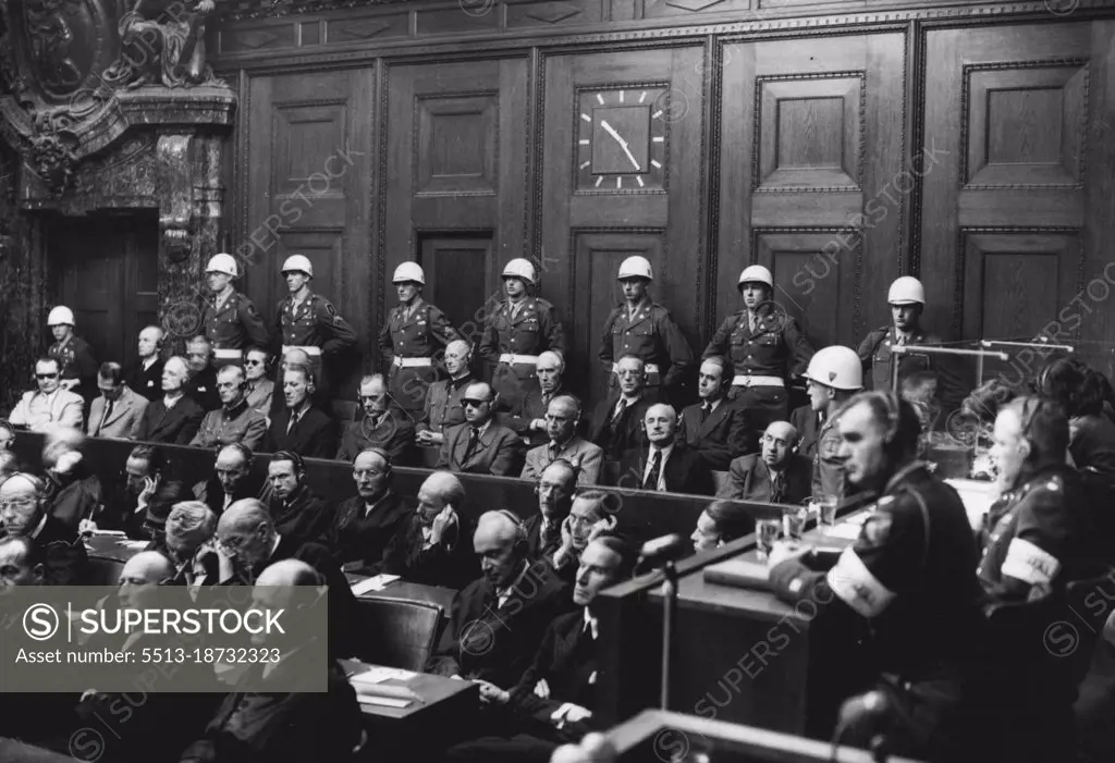 This was the scene on the day of Reckoning -- This historic judgement of Nuremberg, delivered yesterday by British, French, American and Russian judges, decided "that certain of the defendants planned and waged aggressive war against is nations and were therefore ***** of this series of crimes".Nazi Germany's 21 former leaders will hear their individual guilt and the sentences to be awarded today.With their counsel in front and united states guards at the back, the accused listen to be justice Lawrence at Nuremberg. October 1, 1946.