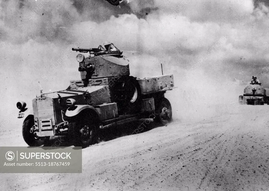 R.A.F. Armoured Gars Aid Bomber In Iraq -- There Armoured cars belong to the unit *****.R.A.F. Armoured dams helped a heavy somber to ***** from Habbaniya aerodrome recently. The bomber was hit through the port wins by anti-aircraft file while attacking Iraqi rebels and the Captain of Aircraft came down on the station, for a landing in the before would have meant Britain capture. Under cover of darkness the damaged wing was repaired and at the first streak of dawn the crew were ready to take off. July 1, 1941. (Photo by British Official Photograph).