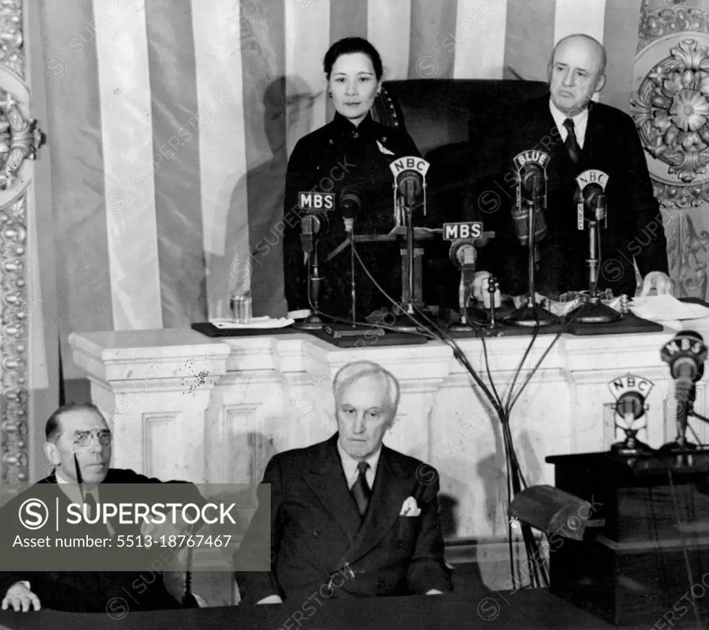 Madame Chiang Kai-Shek Appeals For More Aid -- Before a crowded House Chamber, in her first public appearance, Madame Chiang Kai-Shek appealed to the American people for more aid for China "which has bled and borne unflinchingly the burden of war for more than five and a half years". Madame Chiang is shown as she was introduced by Speaker Samuel Rayburn, right. In the foreground are Rep. Sol Bloom, of N.Y. Chairman of the Foreign relations Committee; Rep. Charles A. Eaton of N.J.; February 18, 1943. 