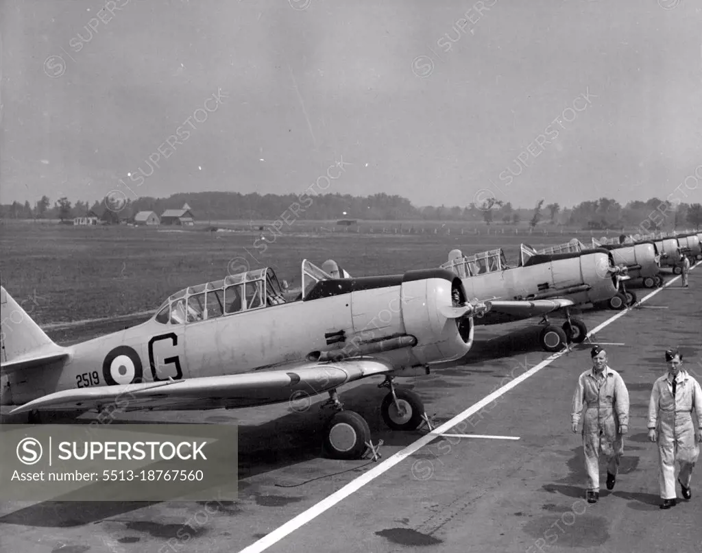 Royal Canadian Air Force -- Harvard trainers at Uplands Airport, Ottawa, stand by for the daily training of Empire air fighters. December 15, 1941.