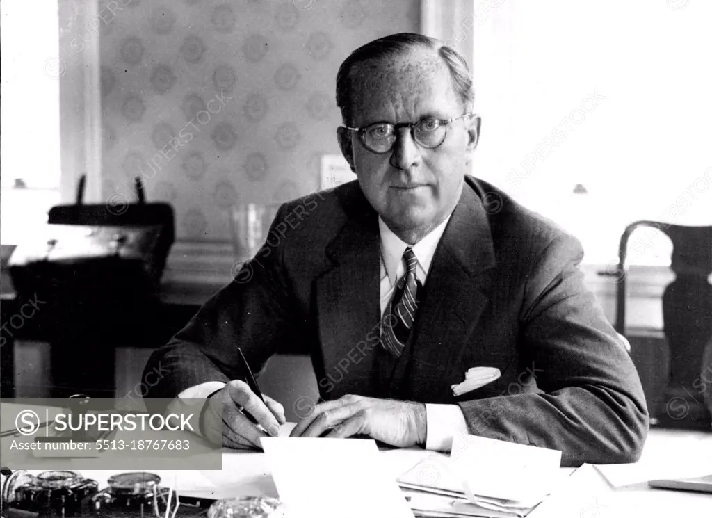 Joseph P. Kennedy, America's new Ambassador to England, photographed at his desk. March 1, 1938. (Photo by Universal Press Agency).