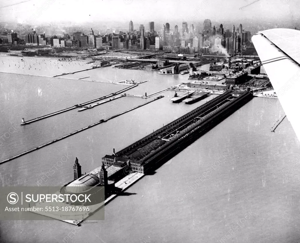 Navy Pier For UniversityThis is an airview of the navy pier on Lake Michigan water front where the city agreed to lease space to the University of Illinois to house a branch. According to the trustees of the University, from 3,500 to 4,000 students could be accommodated at this annex when it is expected to be in operation for the fall term. June 16, 1946. (Photo by Wide World Photos).