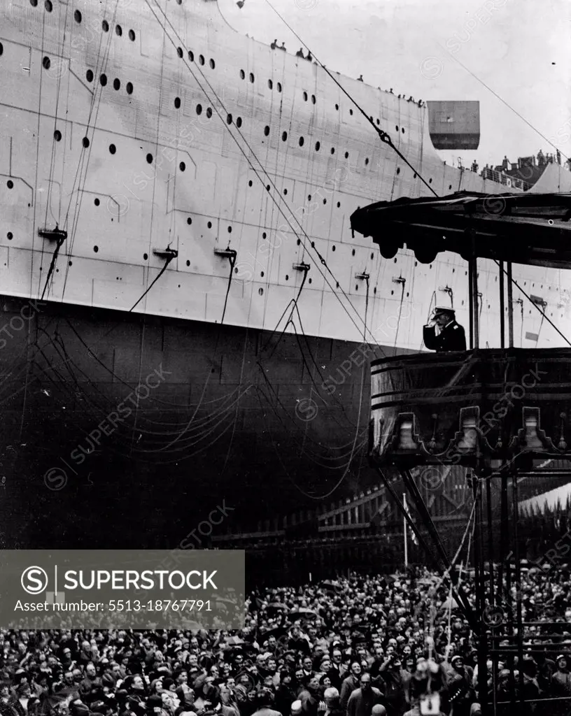 Launch Of The "Queen Mary" -- The King saluting as the "Queen Mary" went down the slip way. September 26, 1934. (Photo by Keystone).