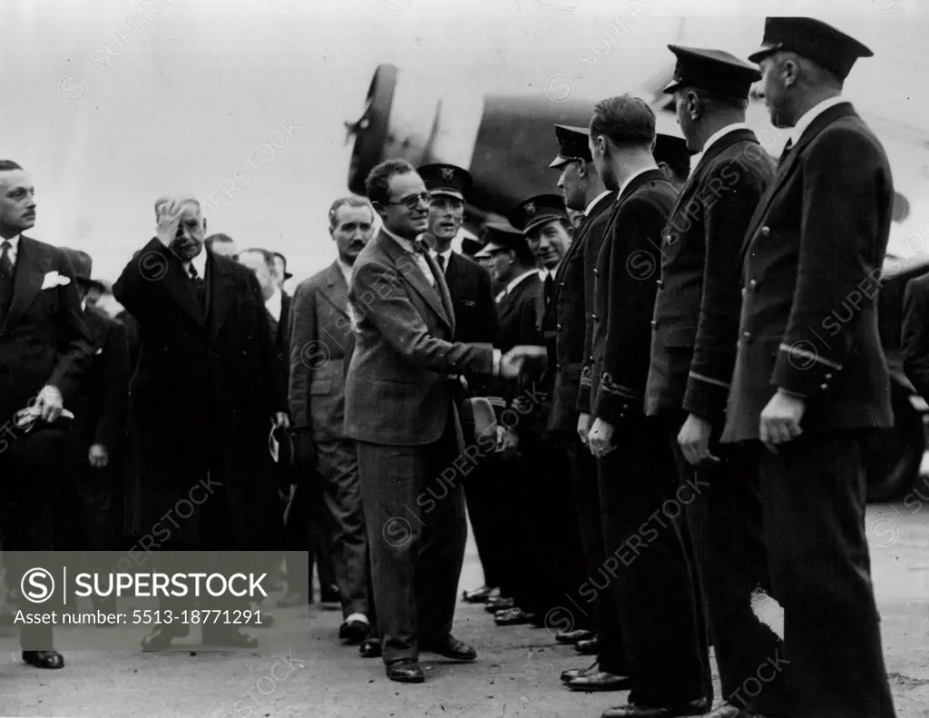 French Air Minister Inaugurates Great New Air LineM. Pierre Cot shaking hands with the pilots of the new line.All the French air lines have now been grouped together into one big concern called Air France. The new organization was brought into being at a ceremony over which M. Pierre Cot, French Minister for Air, presided. October 09, 1933.