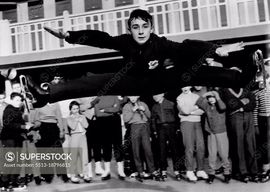 French boy Alain Giletti, who holds the European skating championship, gives an exhibition of his skill in exhibition for some other schoolchildren at Paris. March 26, 1955.