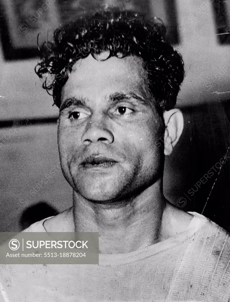 The fighting face of Australian lightweight champion Jack Hassen, who will meet Mexican "Baby" Ortiz at Sydney stadium tonight. May 15, 1950.