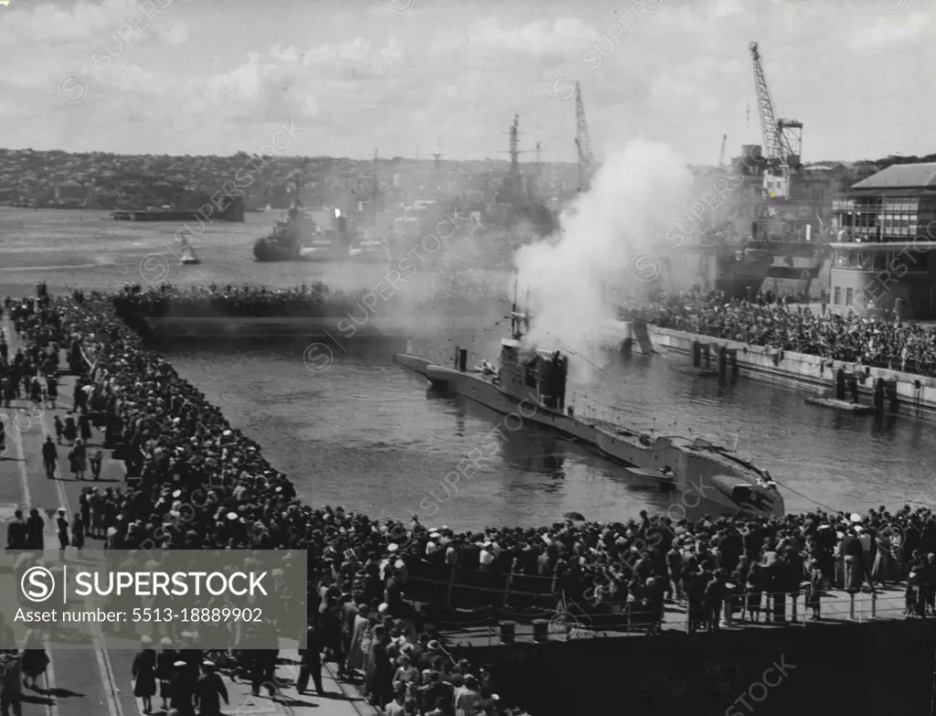 Trafalgar day naval display HMS Tactician firing a salute after diving in the Capt. Cook Dock. October 21, 1950. (Photo by Gordon Herbert Short/Fairfax Media).