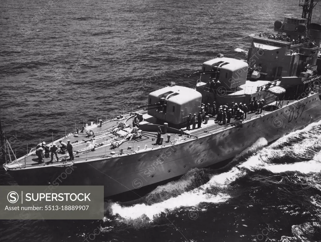 A perfect focal shot of H.M.A.S. Tobruk as she comes alongside Sydney. February 25, 1953.