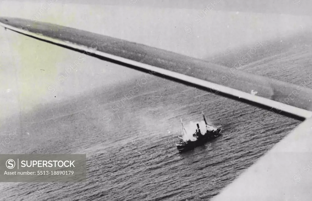 R.A.F. Attack On German Convoy In Helicopter Bight: Bomber of the R.A.F. Flew at mast height to attack a convoy of six ships in Heligoland Bight on 30/7/41. These photographs shows a direct his amidships on a 500 ton ship which was left well alight. August 14, 1942. (Photo by British Official Photograph).