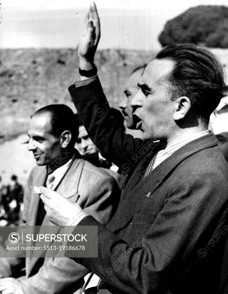 Italian Leaders Asks For Elections.Luigo Longo, (standing on Rostrum), communist leader and former partisan commander in North Italy, addresses 20,000 in the stadium of Domitian on Palatine hill, Rome, Italy, Oct. 14. He asked for immediate elections in Italy to foster democracy and start the nation on the reconstruction road. October 21, 1945. (Photo by Associated Press Photo)