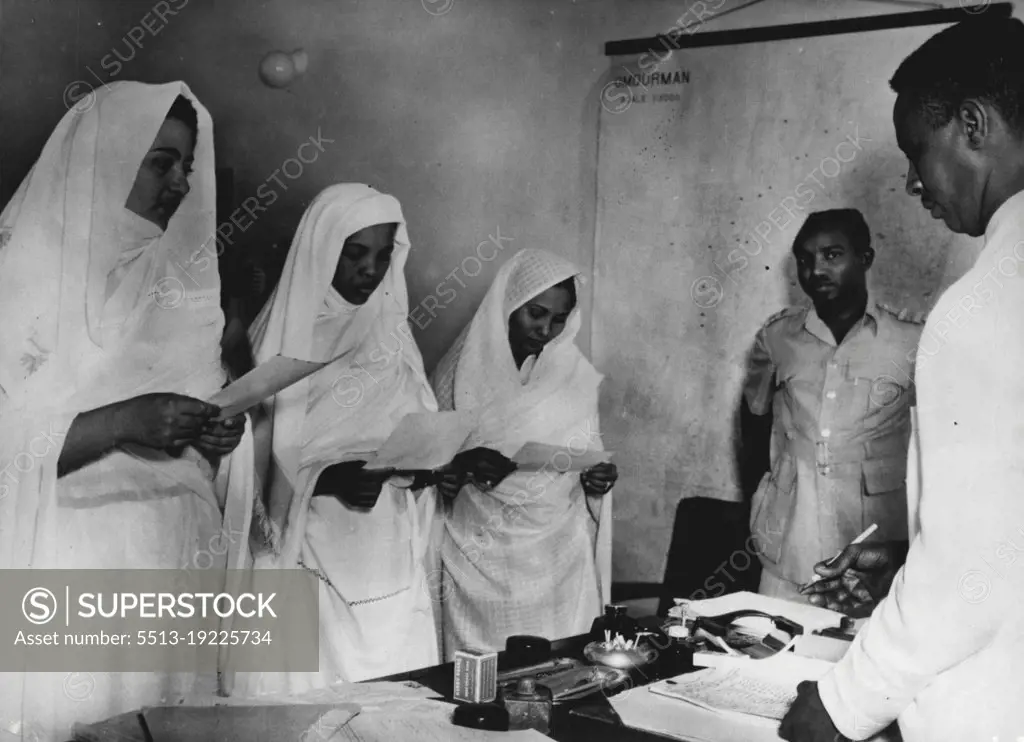 The Sudanese Women May Vote - Women - as women - have no votes in the Sudan. However, the law gives a vote for the graduates' constituency to all Sudanese persons over 21 who possess certain educational qualifications.There are only eight Sudanese women so far qualified, and here are three of them registering their votes in Omdurman for the graduates' constituency.They are Miss Thoraya Ambabi, Miss Amna Ibrahim Malek, and Miss Malthum 'Omar. All three are teachers in Omdurman. December 3, 1953. (Photo by Associated Press Photo).