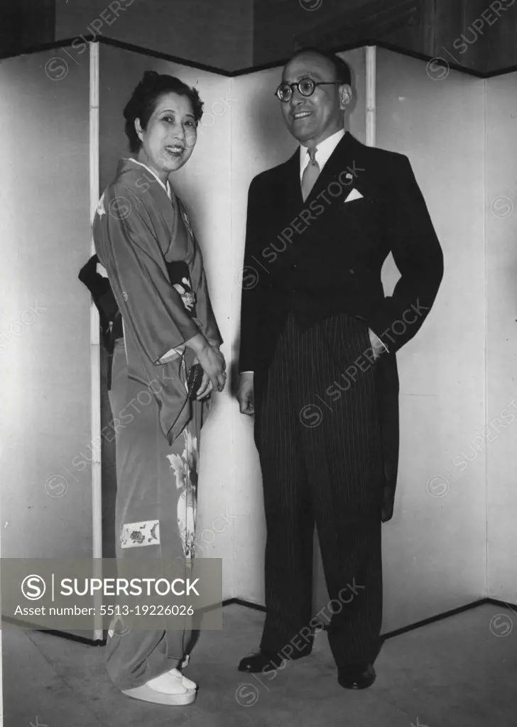 Japanese Ambassador And Wife Give Party -- The Japanese Ambassador to London ad his wife Mr. and Mrs. Shunichi Matsumoto, seen at the Japanese Embassy tonight when they gave a party in celebration of the birthday of the Japanese Emperor. April 29, 1954. (Photo by Peter Skingley, United Press Photo).