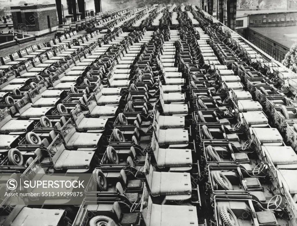 Ready For World Battlefields -- Fast little scout cars of the U.S. Army are massed on the roof of a factory in a Midwest state for shipment to the battlefields of the world. The one-ton "iron horses," rolling by the thousands from an assembly line once devoted to turning out automobiles, arc built from parts supplied by 850 plants scattered throughout the country. November 14, 1942. (Photo by Interphoto News Pictures, Inc.).