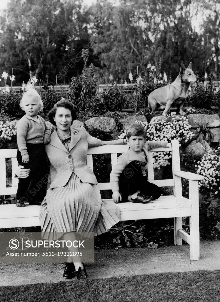 New Photograph of Her Majesty The Queen, Prince Charles And Princess Anne, Have been released for General publication on 1st May; 1956.A happy informal group of the Queen, Prince Charles and Princess Anne in the grounds of Balmoral. The Queen's corgi, Sue, can be seen in the background. May 3, 1953. (Photo by Camera Press Ltd.)