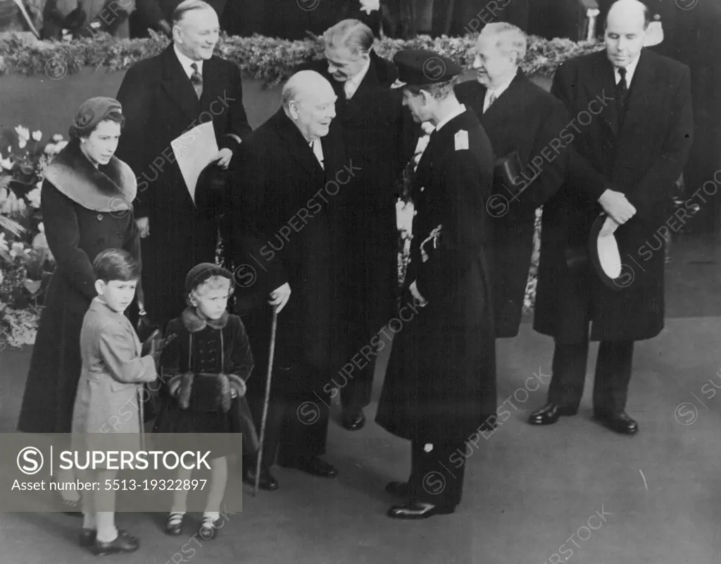 Waiting For The Royal TrainThis pictures was taken at Waterloo station today before the arrival of the Queen mother's train. The Queen brings something of interest to the notice of her children, Prince Charles smooths his glove and Princess Anne's hands are demurely folded in her velvet muff.Sir Winston Churchill talks to the Duke of Edinburgh and between then is Sir Anthony Eden. November 24, 1954. (Photo by London Express News And Feature Services).