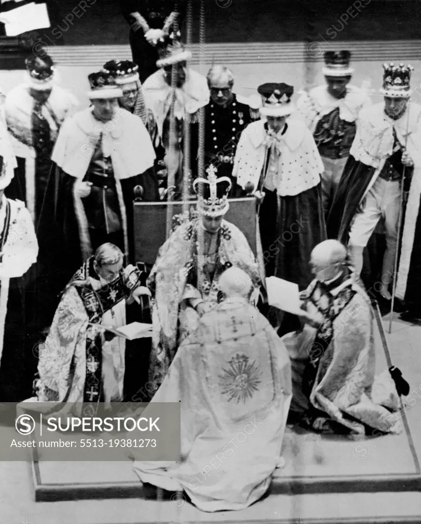 The Coronation Of King George VI And Queen Elizabeth -- The archbishops and clergy paying homage to the newly-crowned King George VI - and impressive moment during the ceremonies in Westminster Abbey today. May 12, 1937. (Photo by Topical Press).