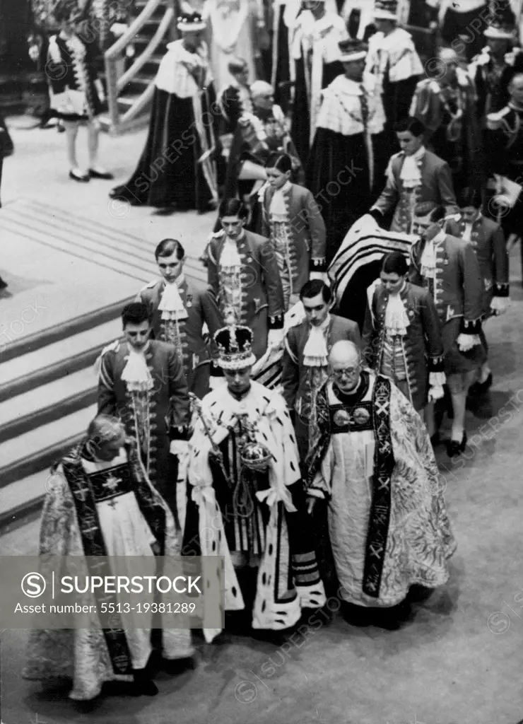 The Coronation Of King George VI, And Queen Elizabeth, Scenes In Westminster Abbey - H.M. The King carrying the Orb and Sceptre, followed by his retinue, leave the Abbey after the Ceremony. May 12, 1937. (Photo by Sport & General Press Association Limited).