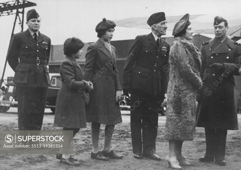 (Right). At an R.A.F. Coastal Command Station, when The King inspected aircraft and quarters and presented awards and decorations. He was accompanied by The Queen, Princess Elizabeth, and Princess Margaret Rose. April 07, 1941.