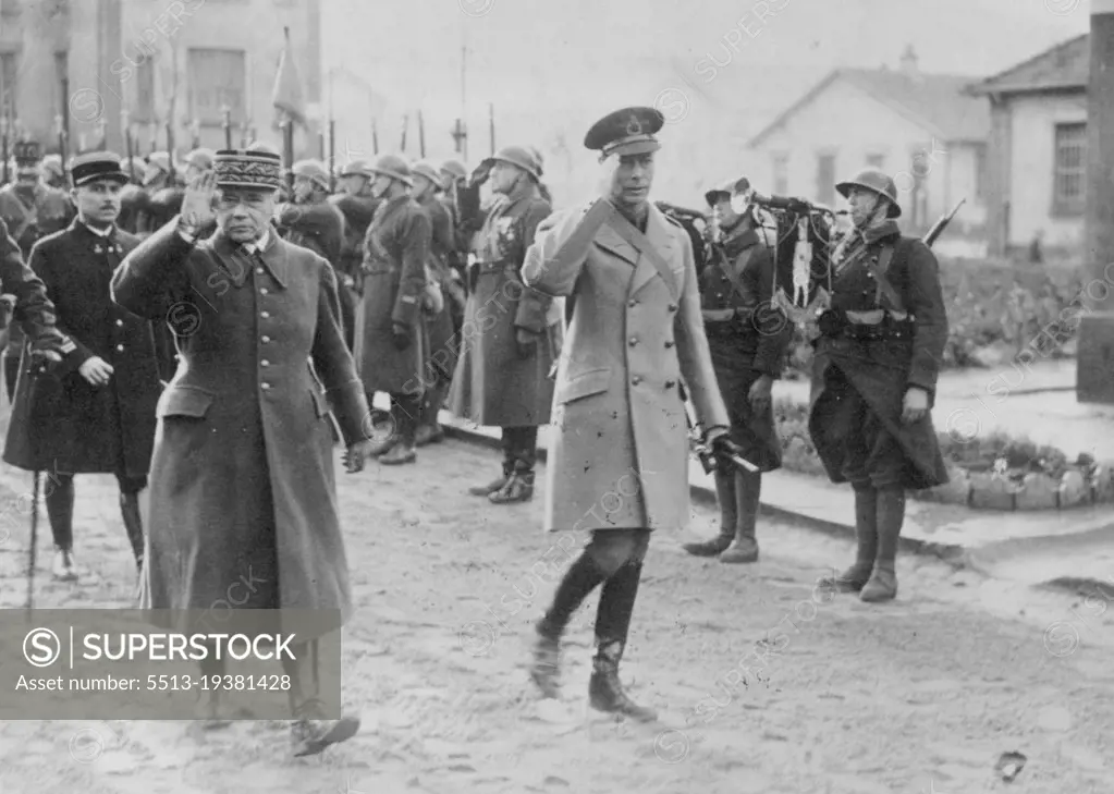 King George in France: His Majesty King George and General Gamelin arrive at one of the villages in the war zone during the King's visit to France. December 15, 1939. (Photo by The Times).