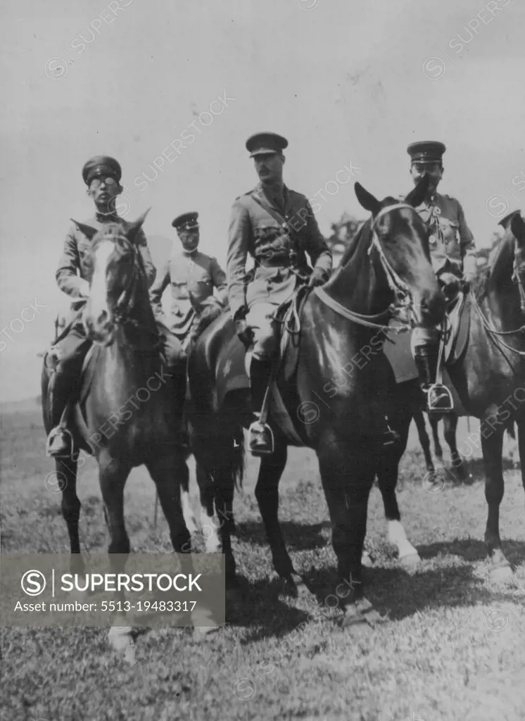 British Prince Reviews Jap Cavalry -- The Duke of Gloucester son of King George of England is shown in center 17ith Prince Chichibu (left) and Japanese Army officers during the Review of the Japanese cavalry troy at Narashino, near Tokio, during the duke's mission in Japan to bestow the most noble order of the garter upon the Japanese emperor. May 21, 1929. (Photo by Associated Press Photo).