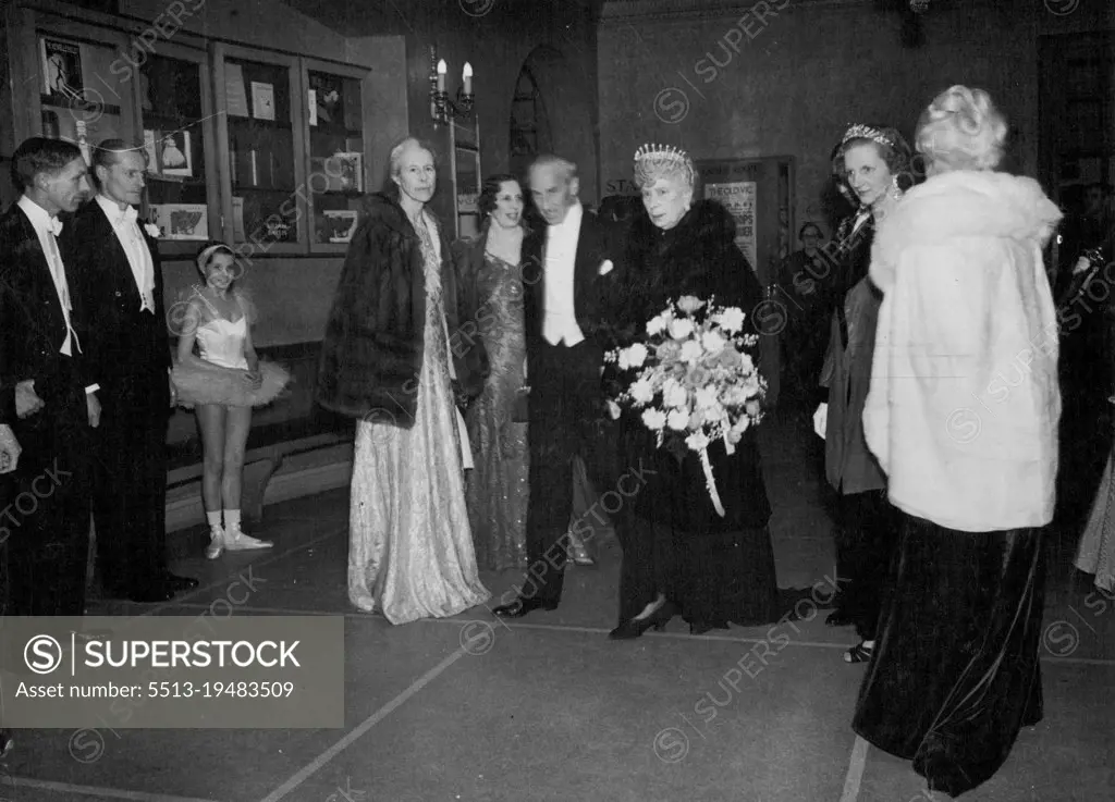 Queen Mary At Sadler's Wells Theatre. -- H.M. Queen Mary photographed on arrival with the Earl of Lytton, who received her, at Sadler's Wells Theater yesterday evening to see Techikovsky's famous Ballet "The Sleeping Princess." The proceeds of this performance will be given the Housing Centre. April 19, 1939. (Photo by Daily Mirror).