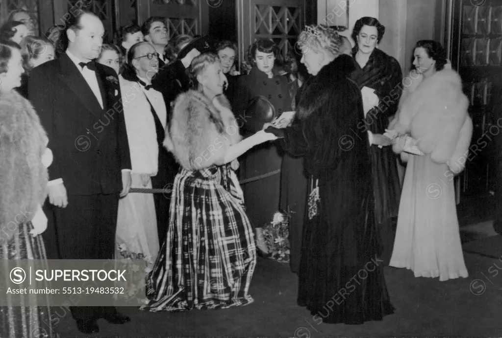 Queen Mary At Film Premiere -- H.M. Queen Mary shaking hands with Mrs. J. Arthur Rank on her arrival. On right are seen the Duchess of Marlborough with the Duchess of Gloucester. H.M. Queen Mary with the Duchess of Gloucester attended the premiere of the new British film "The Passionate Friends" at the Odeon Theatre, Marble Arch, London. January 27, 1949. (Photo by Sports & General Press Agency Limited).