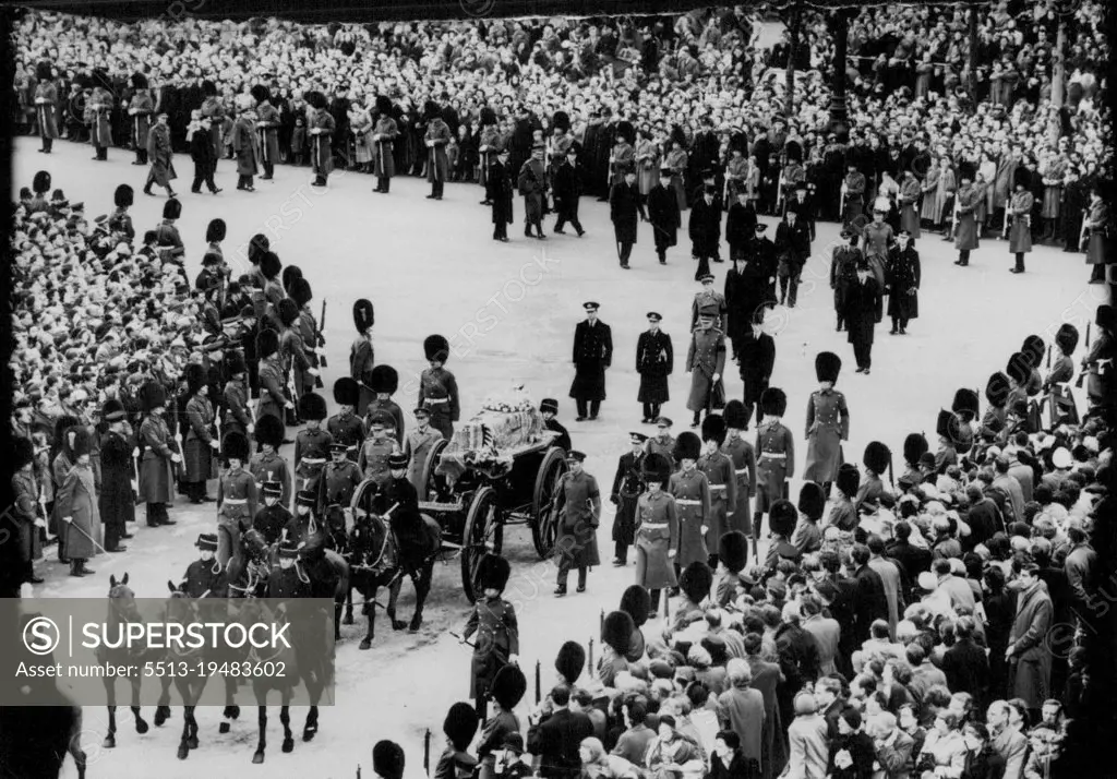 The Funeral Procession of Queen Mary -- The cortege passing from The Mall into the Horse Guards Parade towards Westminster Hall. The body of the late Queen Mary was taken in procession from her residence Marlborough House - to Westminster Hall, where the Lying-in-State will last until the early hours of Tuesday. The coffin will then be taken to Windsor for the burial in St. George's Chapel. March 29, 1953. (Photo by Sport & General Press Agency, Limited).