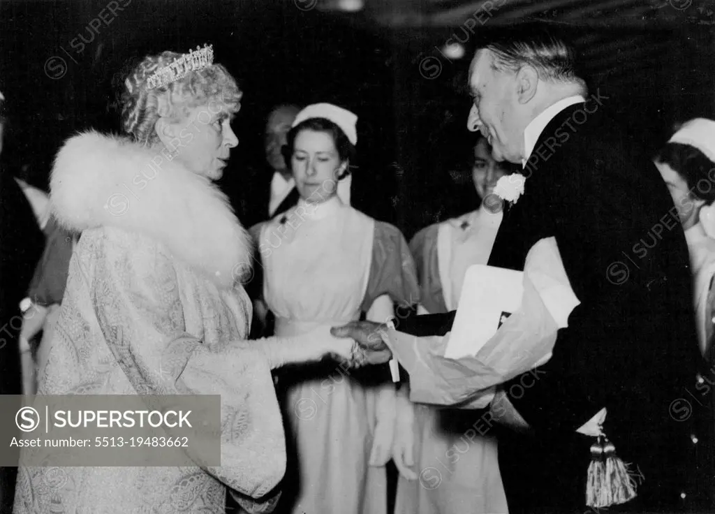 Queen Mary Listens To Gracie Fields -- Queen Mary being greeted by Sir William Goschen at her arrival at the Albert Hall this evening. Gracie Fields, this evening gave her longest stage performance when she sang for more than an hour at the Royal Albert Hall at the Gracie Fields Tribute performance, which was attended by H.M. Queen Mary. October 28, 1938. (Photo by Keystone).