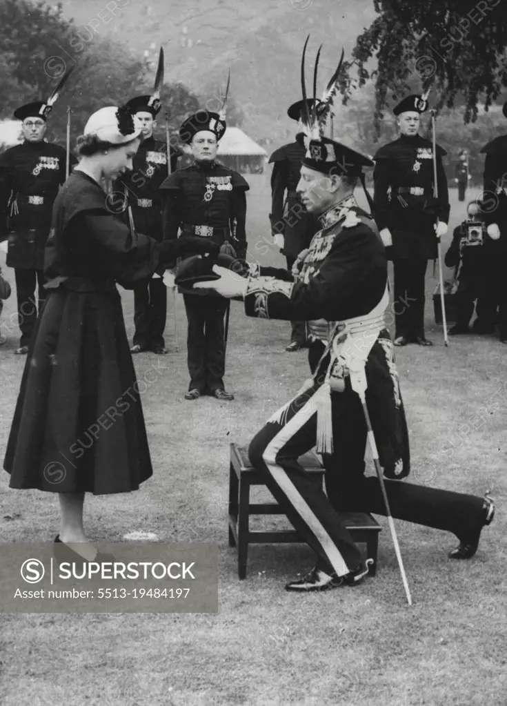 Arrow Brooch for the Queen The Queen receives a reddendo of Arrows in the shape of a brooch from the Duke of Buccleugh, captain of the royal company of Archers, the Queen's bodyguard in Scotland, on June 26. The Queen had just inspected the company in the grounds of the palace of Holyroodhouse, Scotland, where here majesty is staying. June 27, 1952.