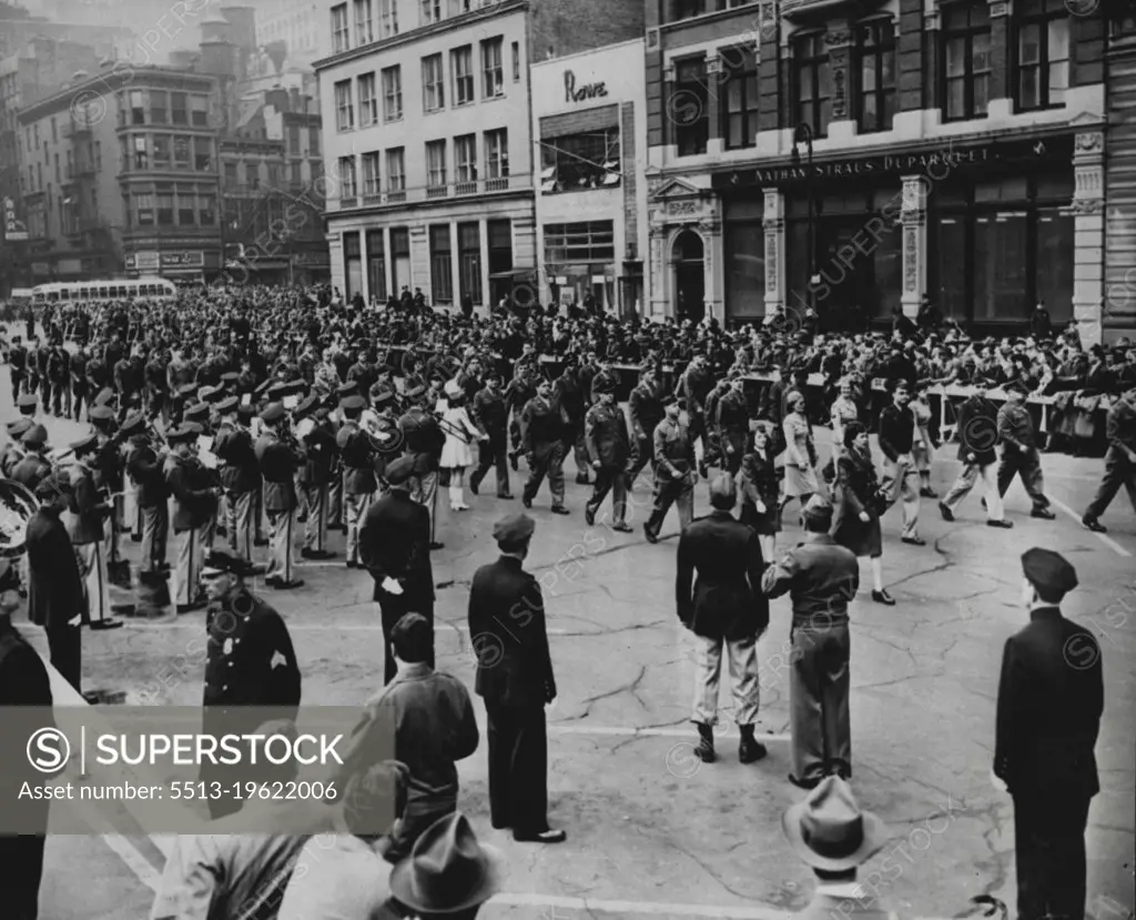 Participate In May Day Parade -- Men and women in service uniform march through Union Square, New York City, May 1, in the May Day parade. Rep. J. Parnell Thomas (R-NJ), chairman of the House committee on Unamerican Activities, in Washington, D.C., May 3, declared a number of Army officers and men took part in a "tresonable demonstration" by marching in the parade. May 3, 1947. (Photo by Associated Press Photo).