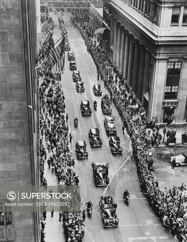 Chicago Hails President Roosevelt -- More than half a million Chicagoans cheered President Roosevelt during his parade through the downtown section of the city and along Lake Shore Drive, where he dedicated the new centennial bridge at the mouth of the Chicago River. Confetti and treamers showering down on his car as he ***** the Board of trade building on Jackson *****. January 10, 1951. (Photo by ACME News Pictures).