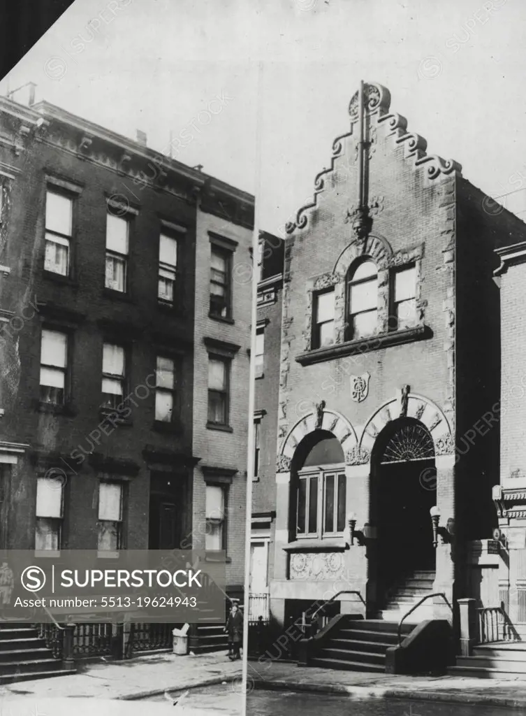 Two Scenes Of Life Of Al Smith : At the left is the house at 25 oliver St. New York City, where governor Alfred E. Smith lived until the last term as governor of New York State. At the right is the downtown Tammany Club where Governor Smith started his political career. This is in Madison St. near the Oliver St. Home. June 20, 1928. (Photo by International Newsreel Photo).