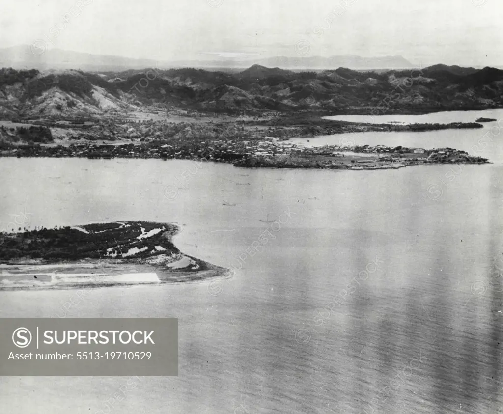 Philippine Objective -- This is the city of Tacloban on Leyte Island in the Philippines, the first objective of General MacArthur's invasion forces. This city of approximately 30,000 population is the first American city to be liberated from Japanese oppression. The north end of the Tacloban airstrip can be seen projecting from the left center of the picture. October 20, 1944. (Photo by Far East Air Force).