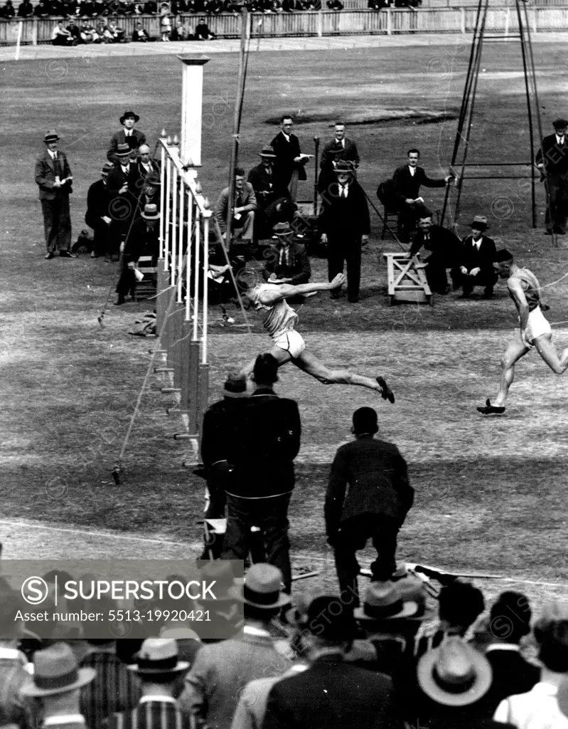 A. Patton (new Rugby League Winger) winning the 6th heat of the Stawell Craft (Professional) football. April 5, 1937.