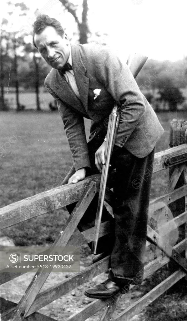 Tom Meet Foord On Tuesday -- Eddie Phillips out shooting at High Beech during his training.Eddie Phillips is now in training at High Beech, Essex, in readiness for his fight with Ben Foord at Harringay ***** on Tuesday next. June 11, 1938. (Photo by Keystone).