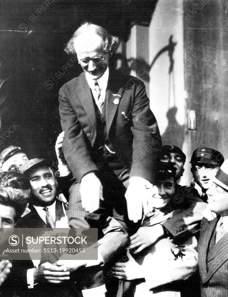 The Hero Of The Stratosphere Flight -- Prof. Piccard, the famous scientist Ballonist being carried off on the shoulders of Admirers on his arrival in Brussells, Crown Prince Leopold and others of the Royal Household were at the station to welcome Prof. Piccard after his marvelous ascent into the heavens in the specially built balloon which reached. A height of nearly ten miles. August 06, 1931. (Photo by International Newsreel Photo).