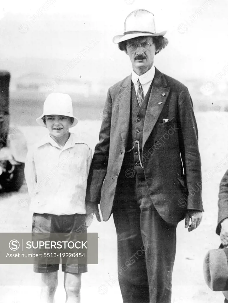 Professor Piccard Ready -- Professor Piccard with his son the airfield at Zurich.Professor Piccard is at Zurich, Switzerland and plans to make his new ascent into the stratosphere today August 10. He goes with a companion to collect more scientific data. September 26, 1932. (Photo by Associated Press Photo).