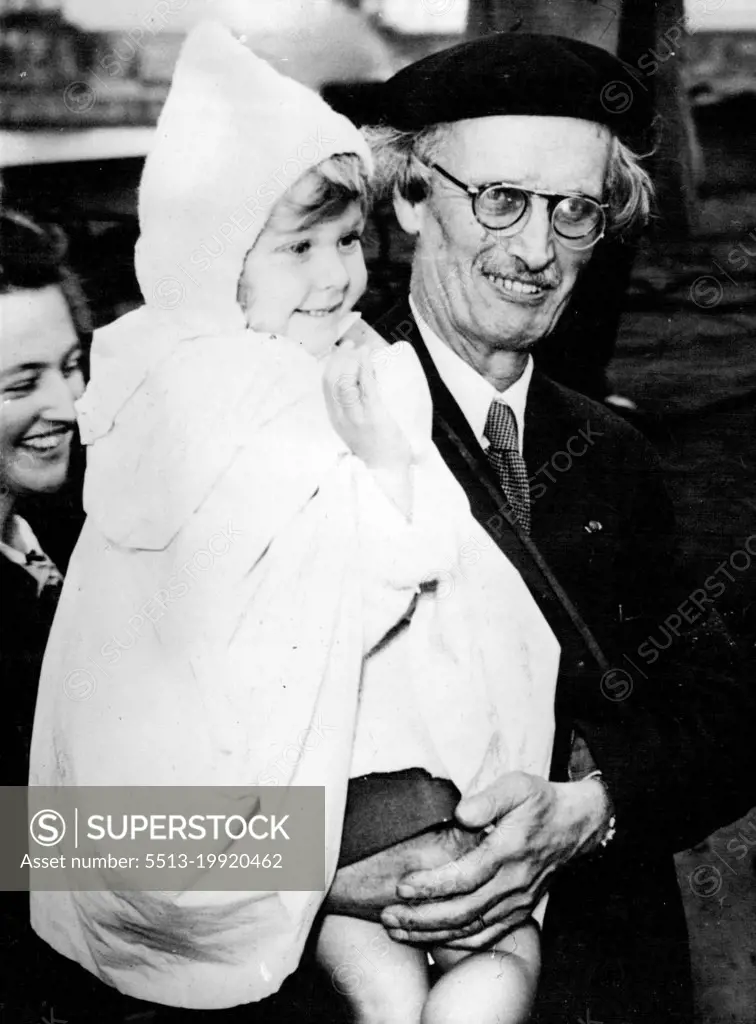 Grand-Dad Piccard Says Good-Bye -- Professor Auguste Piccard, 62, has a farewell Aug for his little grand-daughter at Antwerp, Belgium, September 15, before he left for he gulf of Guinea in the cargo steamer "Scaldis". Inside the ship is stowed the Bathysphere - a forty-ton steel sphere in which (CCARD) and his assistant Professor ***** will attempt the deepest dive in history. They will endeavor to plumb the secrets of the ocean bed at 13,000 feet below the surface. January 1, 1948. (Photo by Associated Press Photo).