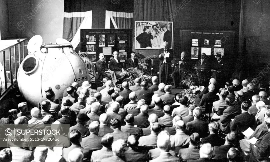 Prof. Piccard Presents Stratosphere Gondola To South Kensington Museum -- The scene during the presentation, showing Professor Piccard seated second from left.M. Jean Williams (Director of Fonds National de la Resherche scientifique) this afternoon presented the Gondola  of the balloon in which Prof. Piccard and M. Cosyns made their 1932 ascent into the Stratosphere, to the South Kensington Museum. The two balloonists were present at the ceremony. June 12, 1935. (Photo by Keystone).