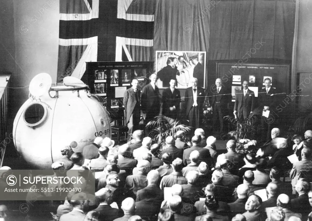 Prof. Piccard ***** Gondola being  placed into the South Kensington Science Museum. Prof. Piccard second from left on platform. August 01, 1935.