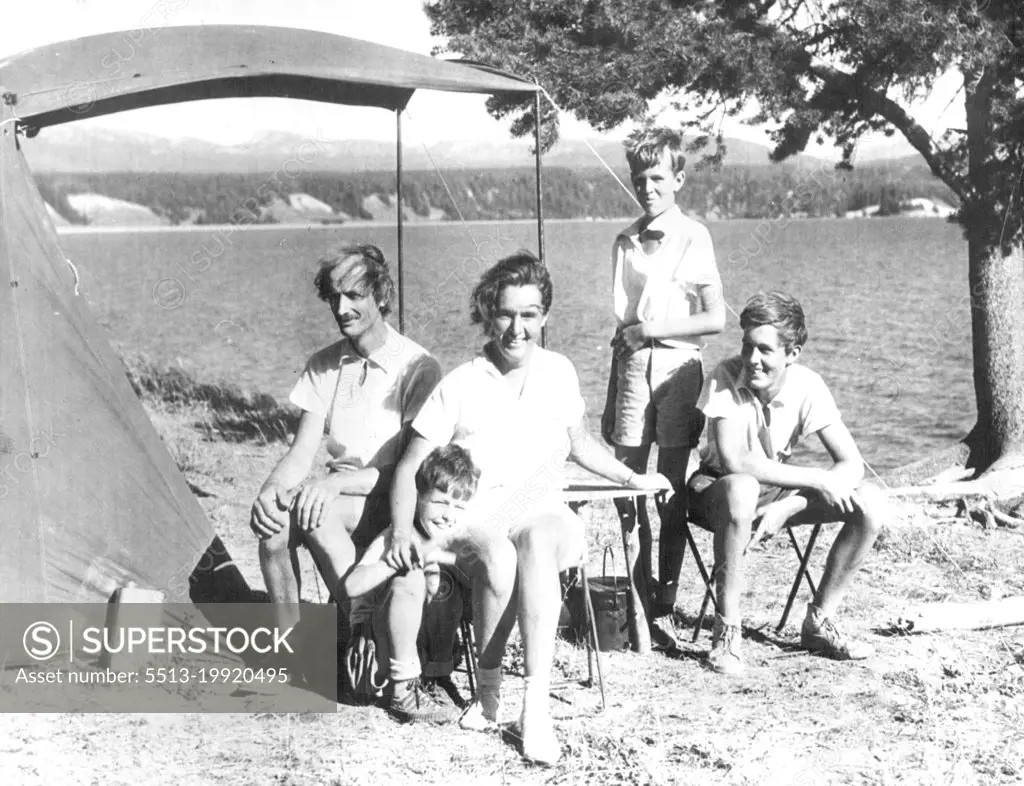 Fresh Air Enthusiasts -- Dr. and Mrs. Jean Piccard, former holders of the stratosphere altitude record, and their three sons vacationing in the open. They are shown on the shore of lake Yellowstone, a wind-swept campsite to be sure. The sons are Donald(left), Paul (Center), and John (Right). August 13, 1935. (Photo by Associated Press Photo).