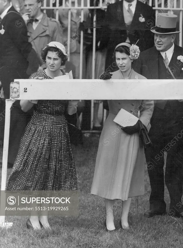 The Queen with Lord Rosebery and Princess Elizabeth, daughter of Prince Paul and Princess Olga, of Yugoslavia, watching the Derby which was won by Phil Drake. June 02, 1955.