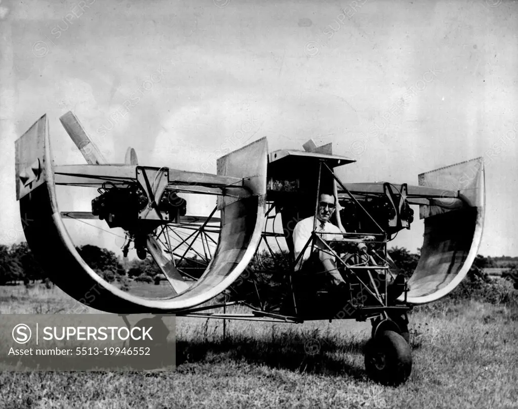 "Channel Wing" Aircraft - Frank D. Kelley, Hagerstown, MD., commercial photographer and president of National Aircraft Corporation, sits at the controls of an unusual aircraft with "Custer Channel Wings", which resemble halves of barrels. Kelley has flown the craft on several brief flights, According to its inventor, Willard R. Custer. July 21, 1948. (Photo by Associated Press Photo).