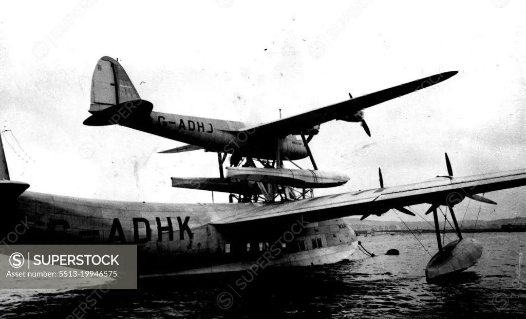 First Pictures of Mayo Composite Flying Boat -- The Mayo Composite on the Medway of Rochester today.The first tests of the Mayo composite plane a large flying seat, the "Maia", and a small seaplane, the "Mercury", ***** place today at *****. October 12, 1937. (Photo by Keystone).